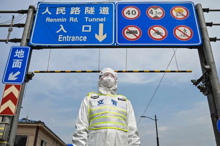 Transit officer wearing PPE in Shanghai