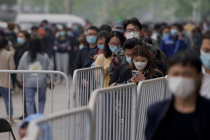 Beijing residents undergo mandatory swab tests