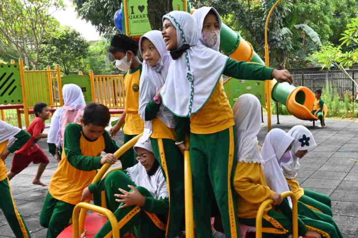 Children at a playground in Indonesia