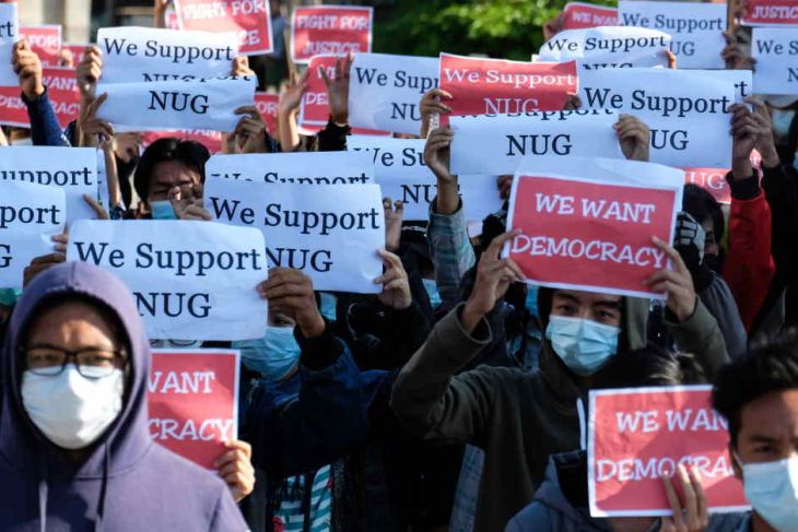 Protestors march in support of the NUG in Myanmar